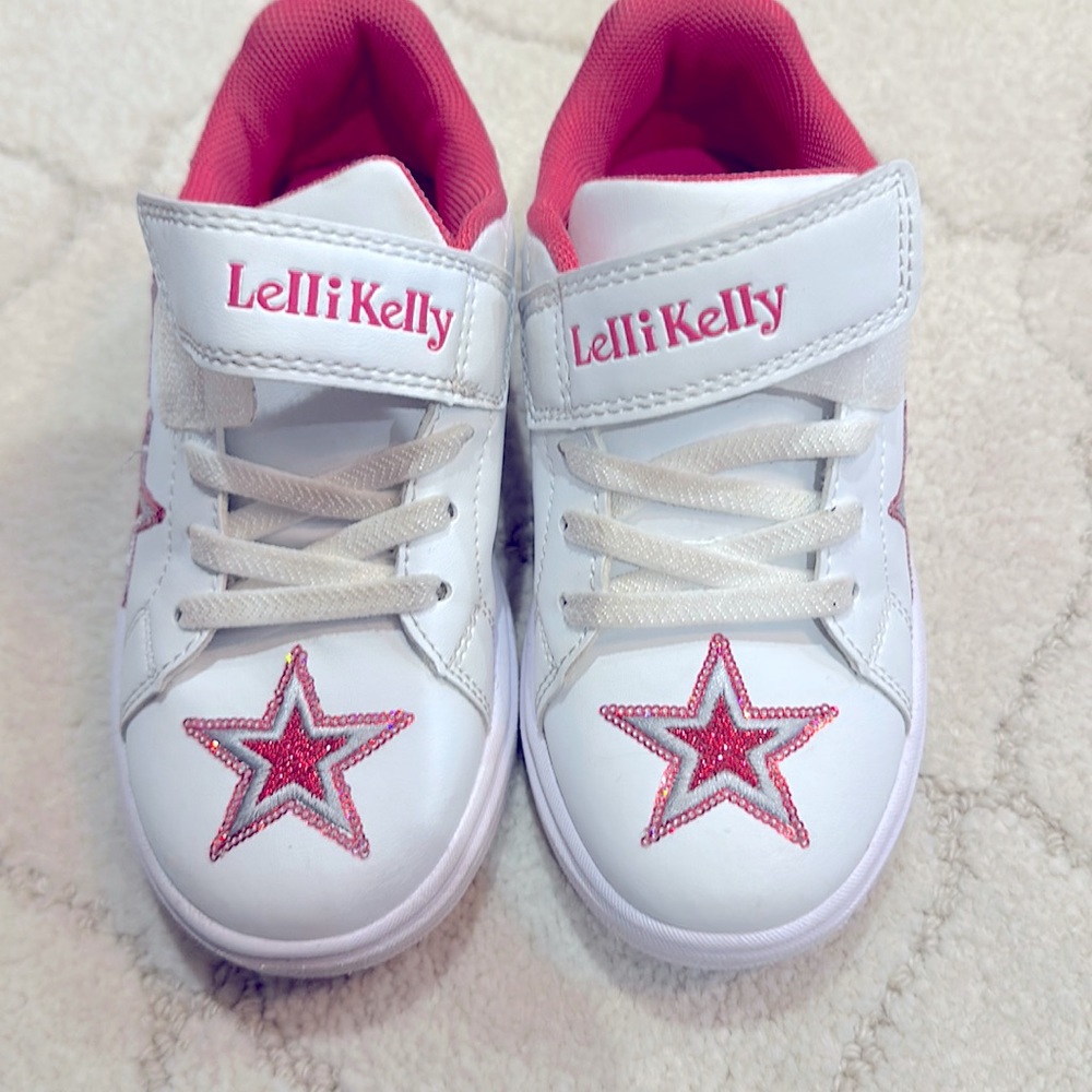 Lelli Kelly size 28 which is 11 toddler in white and pink